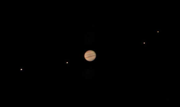 Jupiter and its four largest moons seen from Earth. Image credit: Jan Sandberg.